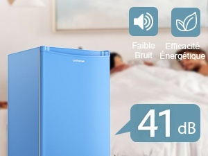 avec indicateur de niveau sonore de 41 dB. Les icônes indiquent les caractéristiques de faible bruit et d'efficacité énergétique. Vue partielle de la cuisine en arrière-plan.