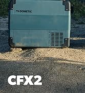 , modèle CFX2, présenté sur un sol sablonneux. Couleur bleu-vert clair avec grille de ventilation visible. Conception robuste pour une utilisation en extérieur.