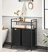 avec structure en métal noir, étagères supérieures en bois et deux tiroirs en tissu noir. Comprend des objets de décoration sur les étagères et des accessoires muraux ci-dessus