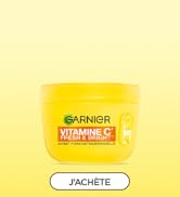 Le texte indique « GARNIER » et « SACHETE ». Mise en page publicitaire de produit teintée en jaune avec texte et éléments de marque.
