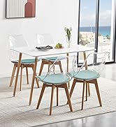 la table à manger est un design moderne avec une table blanche et des chaises bleues.