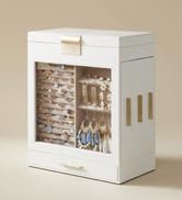 une maison de poupée en bois blanc avec une porte vitrée et des étagères