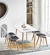 la table à manger est un design moderne avec un design moderne.