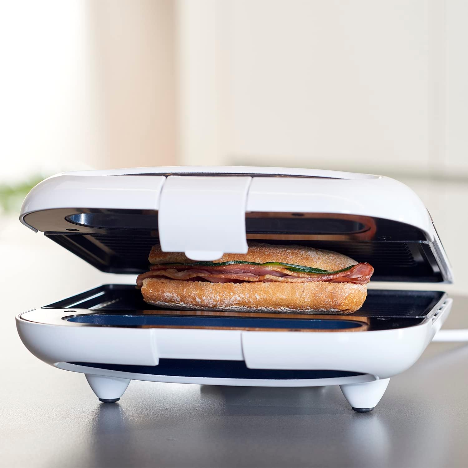 Taurus - Phoenix Luxe - compact inox 800W, plaques antiadhésives, voyants, blanc